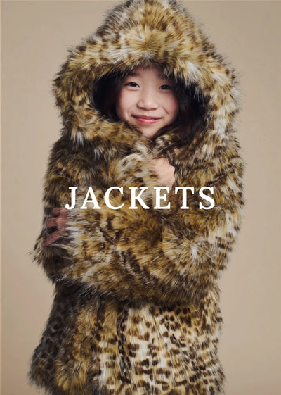 A child wearing a hooded faux fur jacket with a leopard print pattern, posed against a solid beige background with the word 'JACKETS' overlaid across the center.