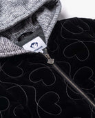 Close-up of the Silver Hearts Bomber Jacket featuring heart embroidery and zip closure, designed for comfort and style.