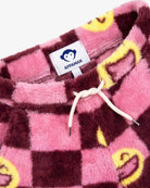 Close-up of the elastic waistband and cozy fabric of Pink Cozy Pants by Appaman.