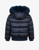 A navy blue puffer jacket with a dark navy faux fur hood trim, shown from the back against a light gray background.