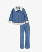 A children's two-piece denim outfit consisting of a blue zip-front jacket with a cream-colored faux-fur collar, cuffs, and hem, paired with matching blue denim cargo pants, shown on a light gray background.