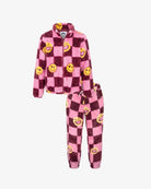 A two-piece plush pajama set featuring a pink and dark purple checkered pattern with yellow smiley face patches, shown on a light gray background.
