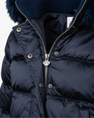Appaman girls' navy puffer bomber jacket, close-up zip and snap detail.