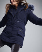 Navy Sparkle Middie Puffer Coat with faux fur hood, perfect for winter fun and stylish playtime.