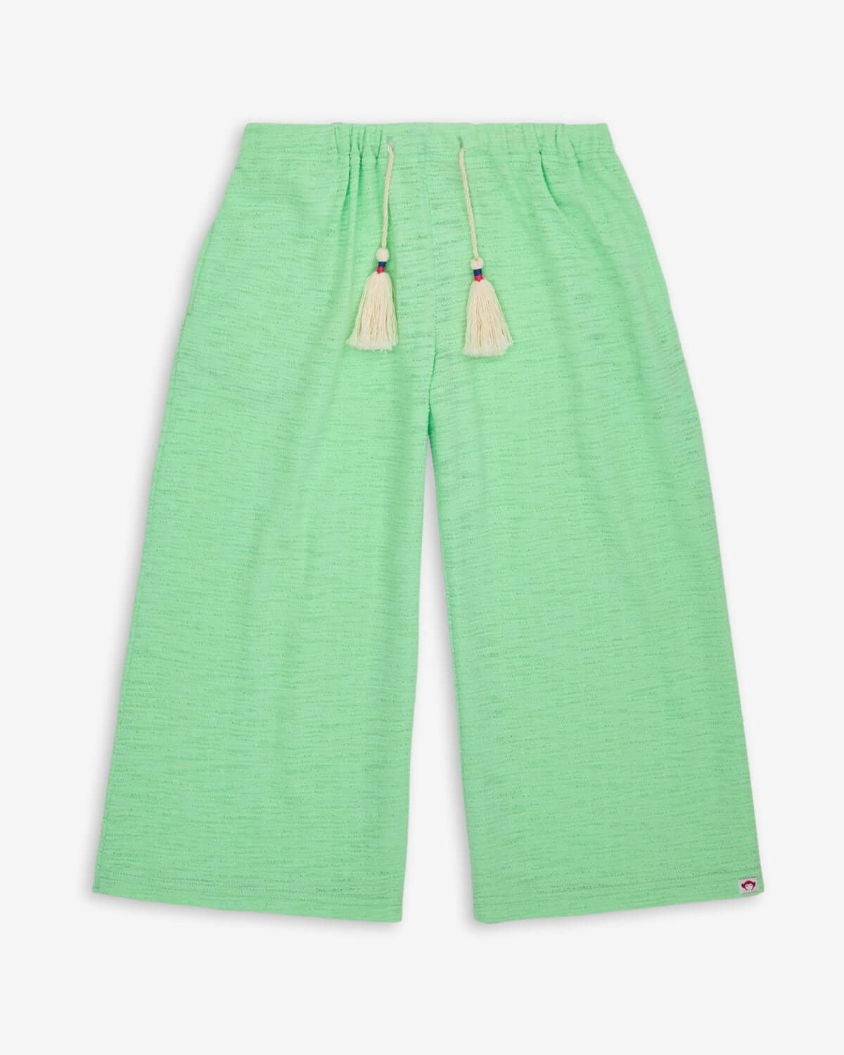 Mint Beach Pant in mint green, featuring light fabric and stylish tassel details for summer adventures.
