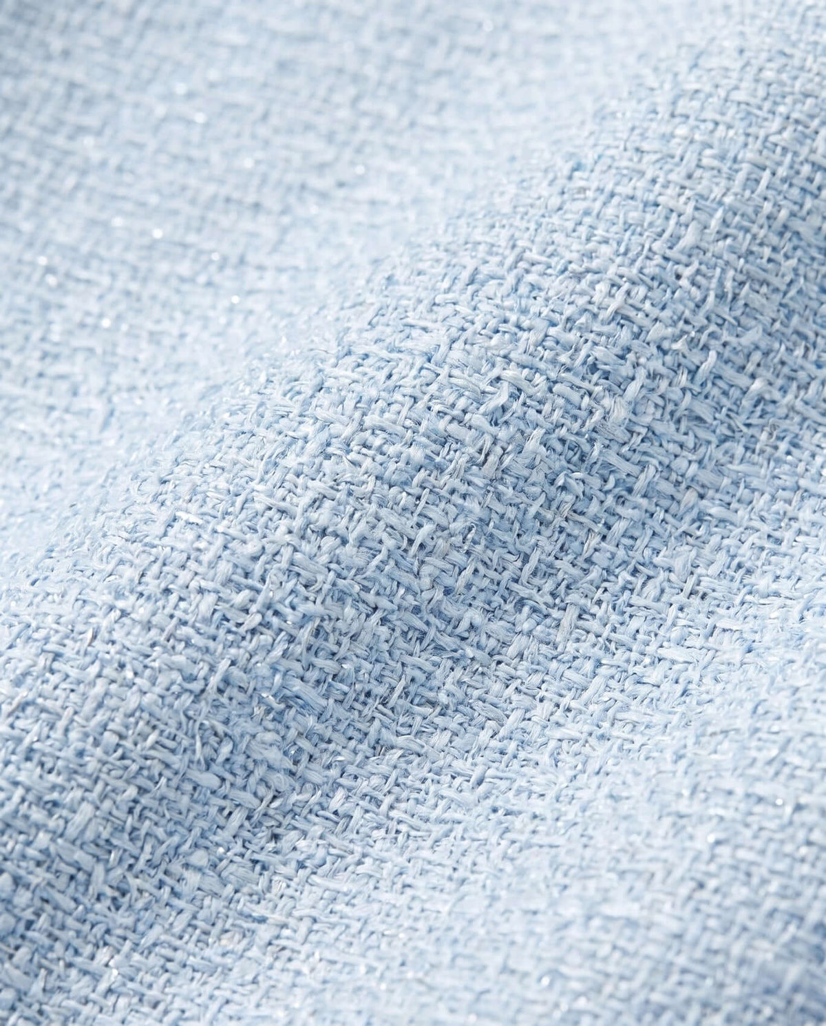 Light Blue Molly Drop Waist Dress fabric close-up showcasing soft, textured light blue material ideal for cold-weather styling.