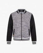 Black Boucle Nikki Bomber Jacket featuring luxe texture, ribbed details, and modern zip-front closure.