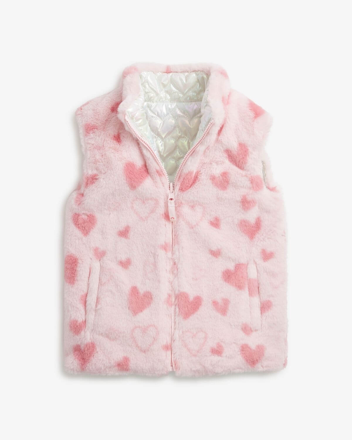 Pink Hearts Girls Reversible Vest featuring soft, fuzzy pink hearts and cozy pockets.