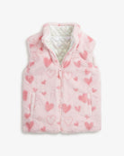 Pink Hearts Girls Reversible Vest featuring soft, fuzzy pink hearts and cozy pockets.