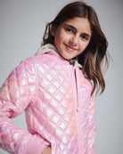 Pink Shine Bomber Jacket worn by a smiling girl with long hair, featuring a shiny quilted design and oatmeal hood.