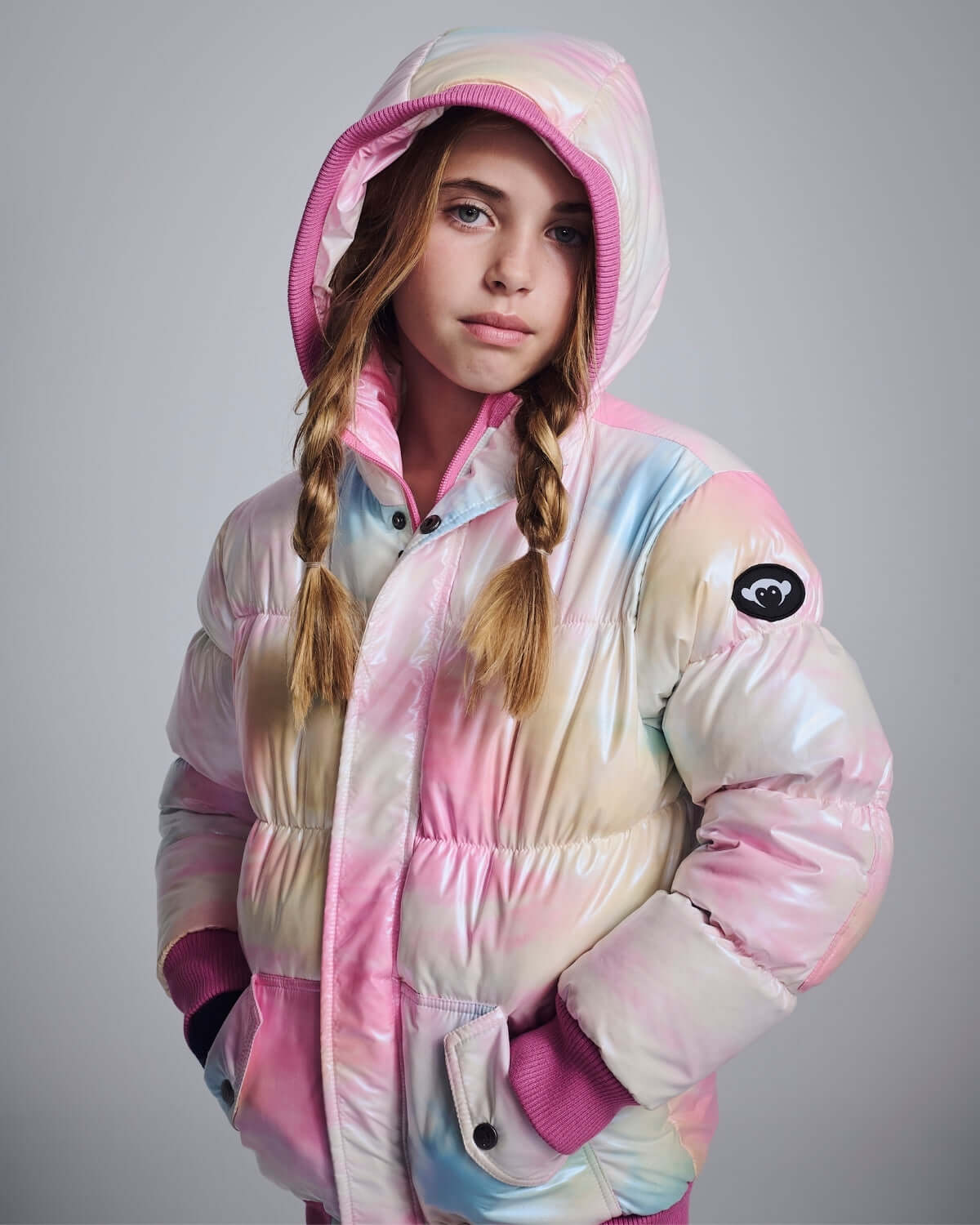Iridescent Pink Slim Puffy Coat featuring a hood and colorful marble pattern, perfect for chilly days.
