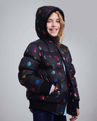Rainbow Snowflakes Slim Puffy Coat on a girl, showcasing vibrant colors and cozy warmth, perfect for winter.