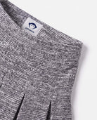 Black Boucle Yoke Pleated Skirt showing pleats and Appaman label detail.