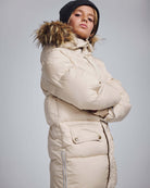 Ivory Expedition Puffer Coat worn by a model with a faux fur hood trim against a neutral background.
