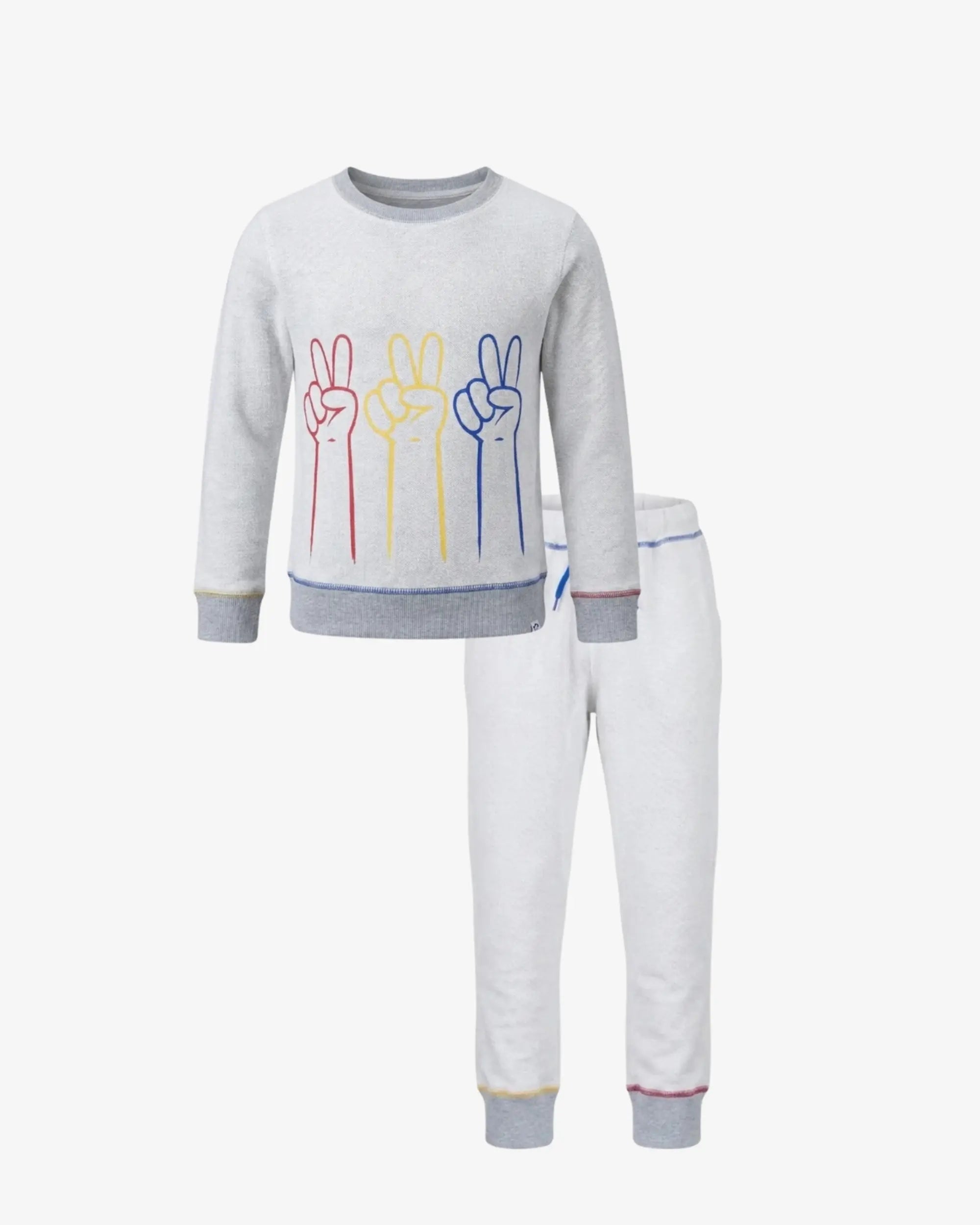 A children's two-piece knit pajama set featuring a light gray long-sleeve top with a colorful peace sign graphic and matching white pants with gray cuffs.