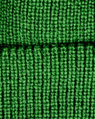 Cozy hunter green knit texture of the slouchy Haze Hat—perfect for stylish kids ready for winter adventures!