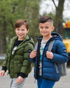 Two stylish boys rock cozy jackets—one in green, the other in blue—perfect for back to school adventures!
