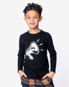 Vibrant kid rocking the Get Loud Graphic Tee—stylish black cotton for back-to-school fun in high-quality kids clothes!