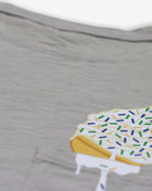 Close-up of a fun ice cream graphic on a gray pocket tee, perfect for stylish kids' adventures this summer!