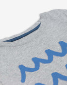 Close-up of Waves Graphic Tee in soft grey with playful blue wave design—ideal for stylish kids' outfits!