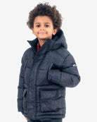 Stylish boy in a cozy black Summit Puffer Coat with trendy graphing print, perfect for winter adventures and back to school!