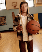 Cool kid in Lumber Plaid Glen Hooded Shirt, ready for basketball fun and stylish adventures! Perfect back-to-school look.