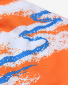 Vibrant blue and orange wave pattern on Appaman’s 90s Retro Swim Trunks, a fun addition to kids' back to school swimwear!