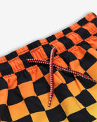 Vibrant orange and black checkerboard pattern on Appaman swim trunks with a stylish drawstring. Ideal for kids' summer fun!