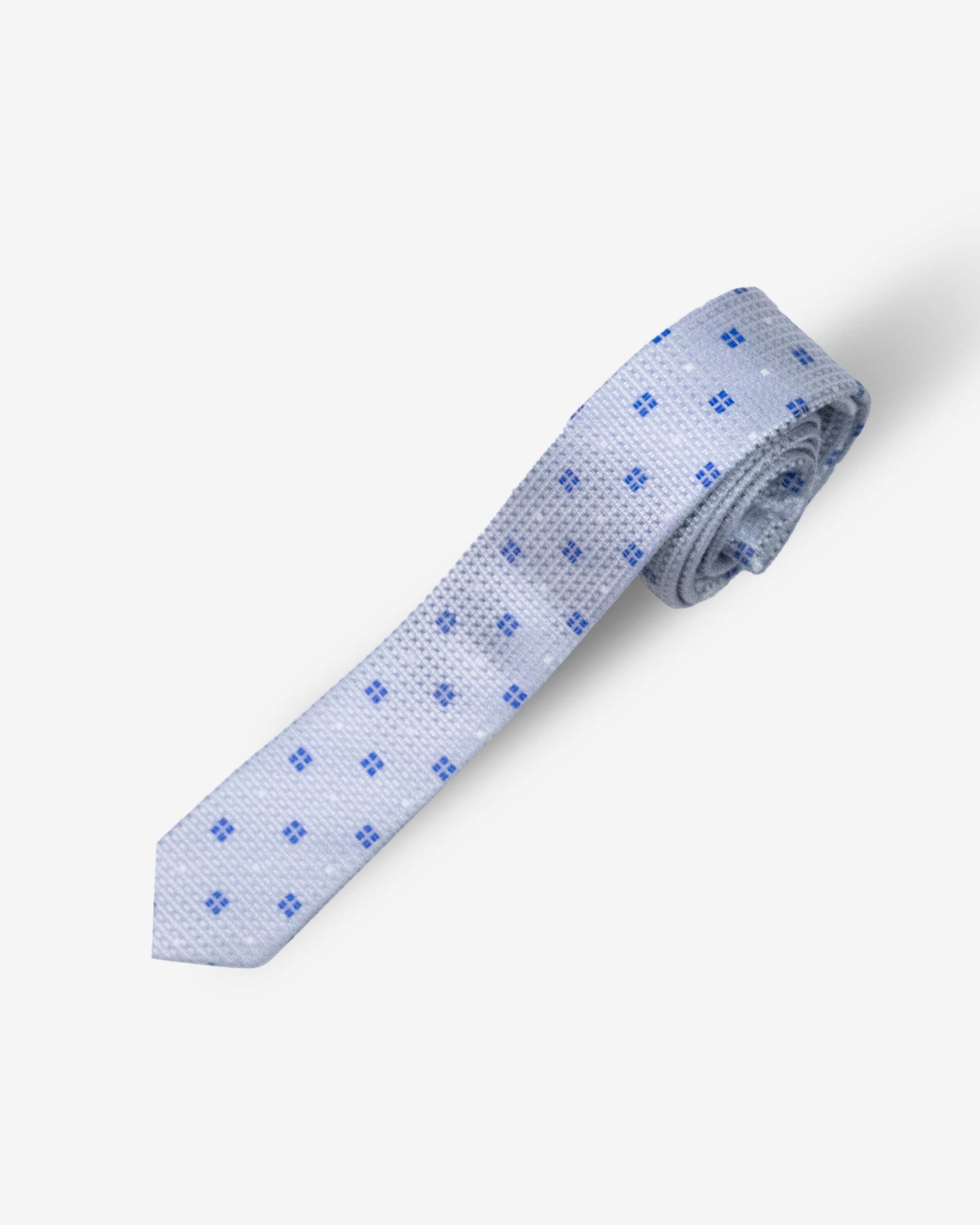 Silver Blue Squares Tie featuring a playful blue square pattern on a light grey background, ideal for kids' outfits.