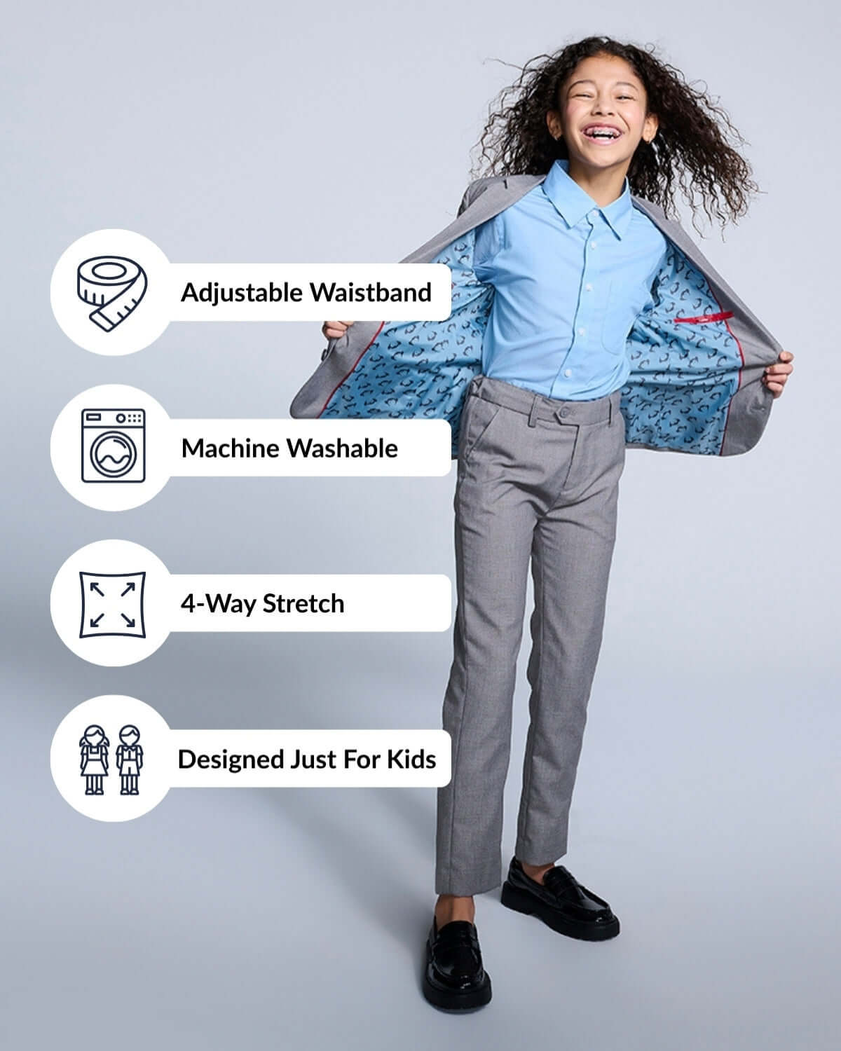 Young model showcasing the Mist Mod Suit with features like adjustable waistband and machine washable fabric.
