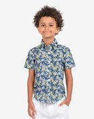 Stylish kid rocking the Navy Daisy Day Party Shirt, a must-have for fun gatherings and trendy back-to-school vibes!