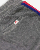 Close-up of soft grey Lori shorts with a colorful waistband—stylish kids clothes for fun adventures!