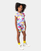 Stylish girl rocking colorful Multi Bike Shorts with matching tee—perfect for back to school fun! High-quality kids clothes!