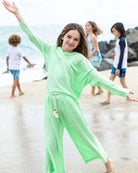 Girls' mint green beach sweatshirt bringing fun vibes at the shore with stylish kids. Perfect blend of comfort and playful fashion!