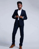 Appaman boys' navy two piece suit, shown on a model.