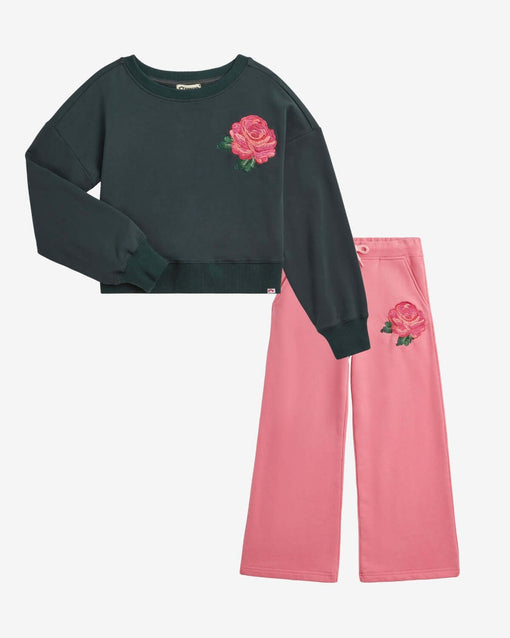 Rose Sweat Set featuring a dark green cropped sweatshirt with pink rose detail and matching pink sweatpants.