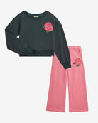 Rose Sweat Set featuring a dark green cropped sweatshirt with pink rose detail and matching pink sweatpants.