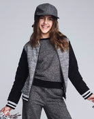 grey jacket on girl