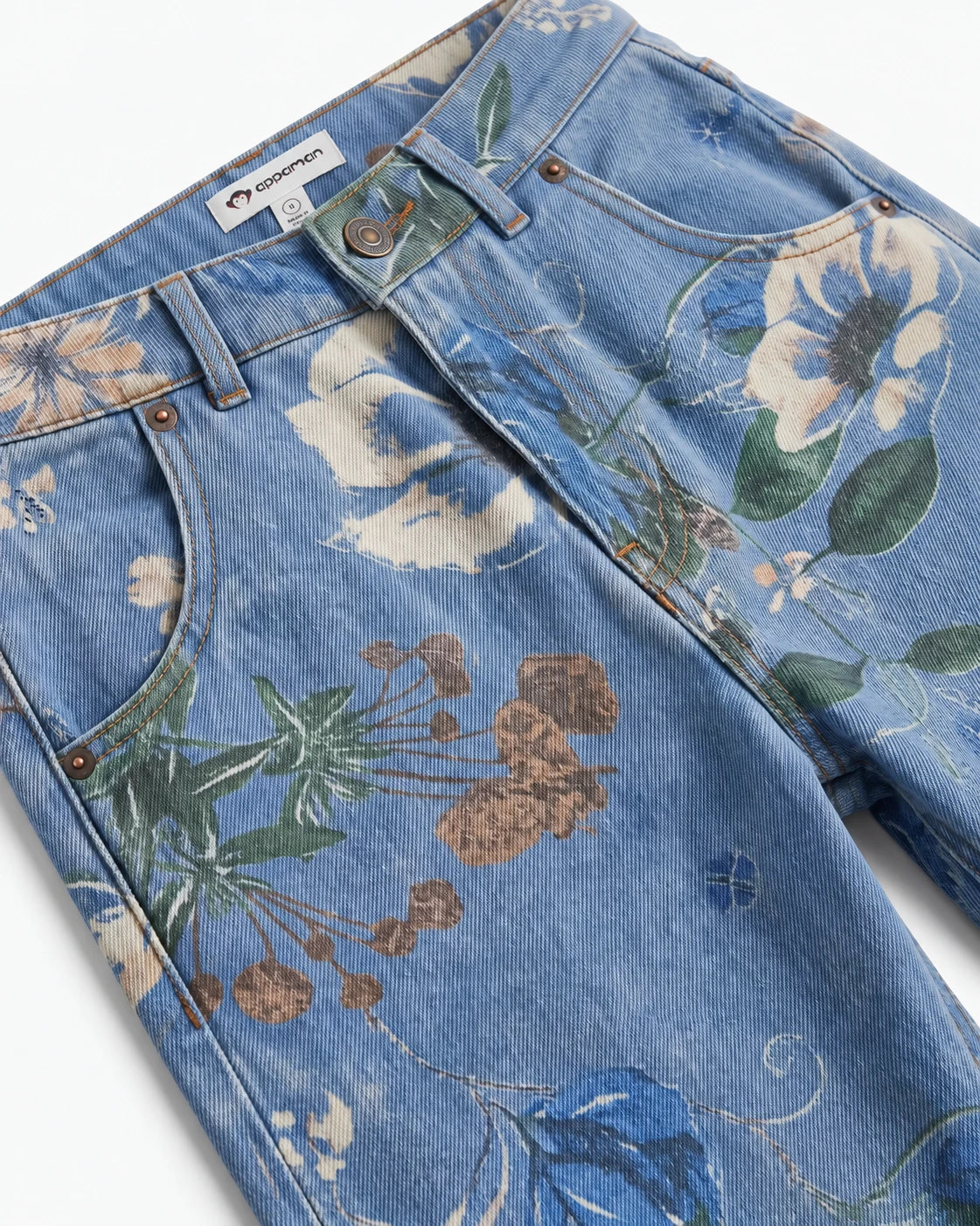 Appaman girls' floral print denim jeans, close-up waist detail.
