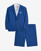 Blue children's suit with a white shirt and blue handkerchief on a light gray background