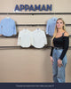 woman presenting the differences between stretchy and standard shirts