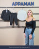 woman showing tuxedo jacket, pants and shirt