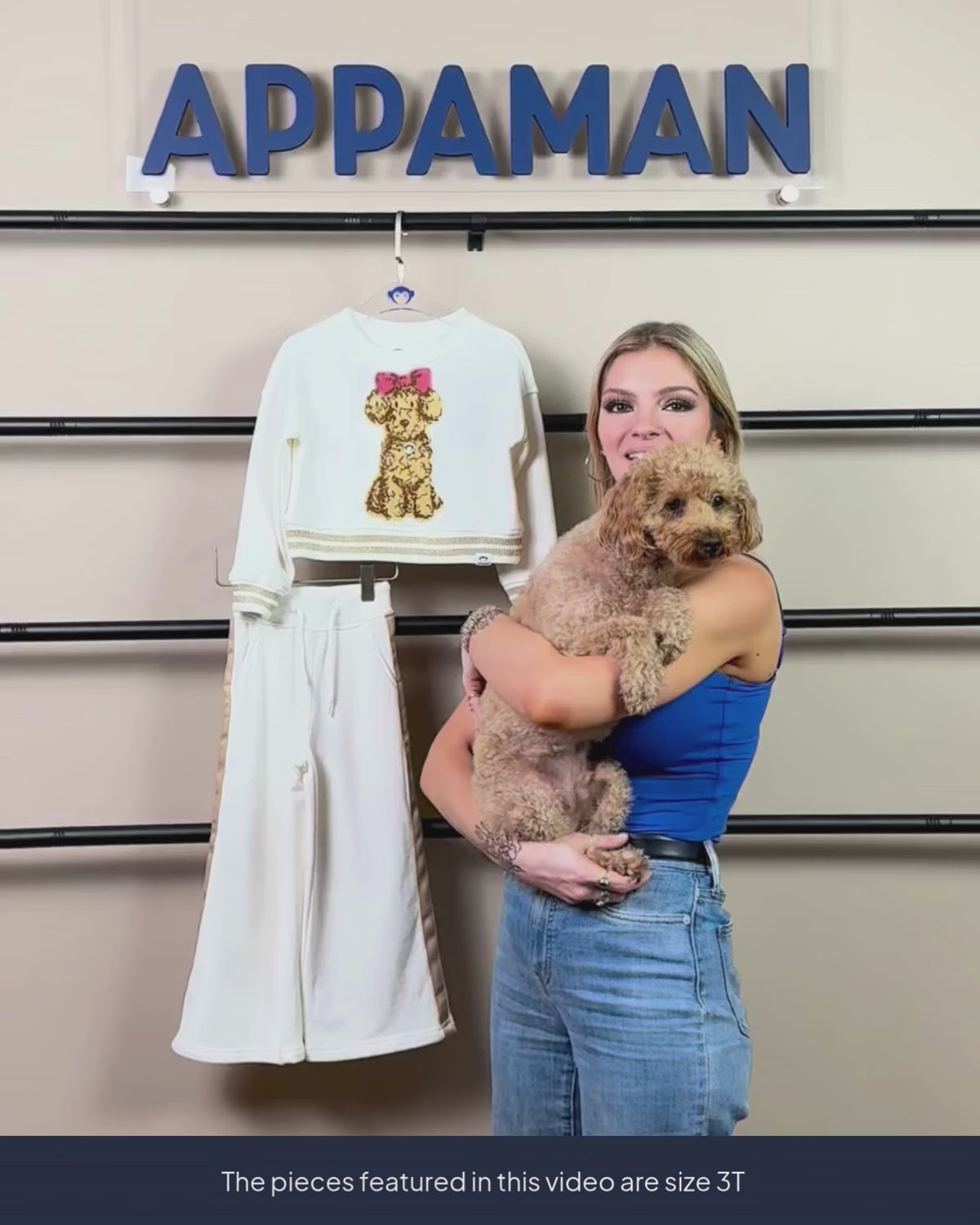 woman carrying dog, presenting the new fall winter collection