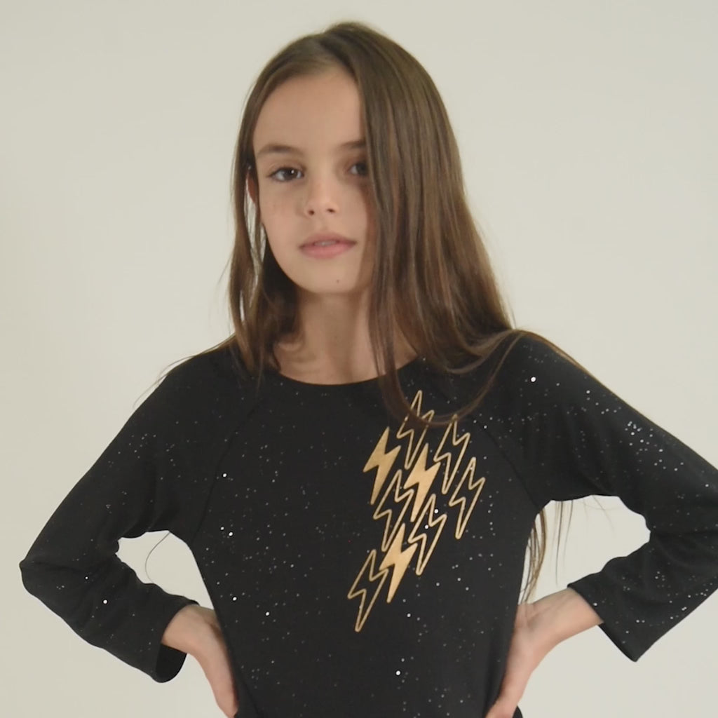 Girls Black Sparkle Long Sleeve Top with Gold Lighting Bolt Graphic featuring Sparkly Fabric
